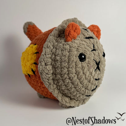 Crochet Cat on a white background. Nest of Shadows watermark.