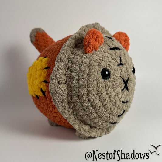 Crochet Cat on a white background. Nest of Shadows watermark.